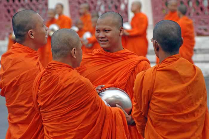 monks talking-AsiaPhotoStock